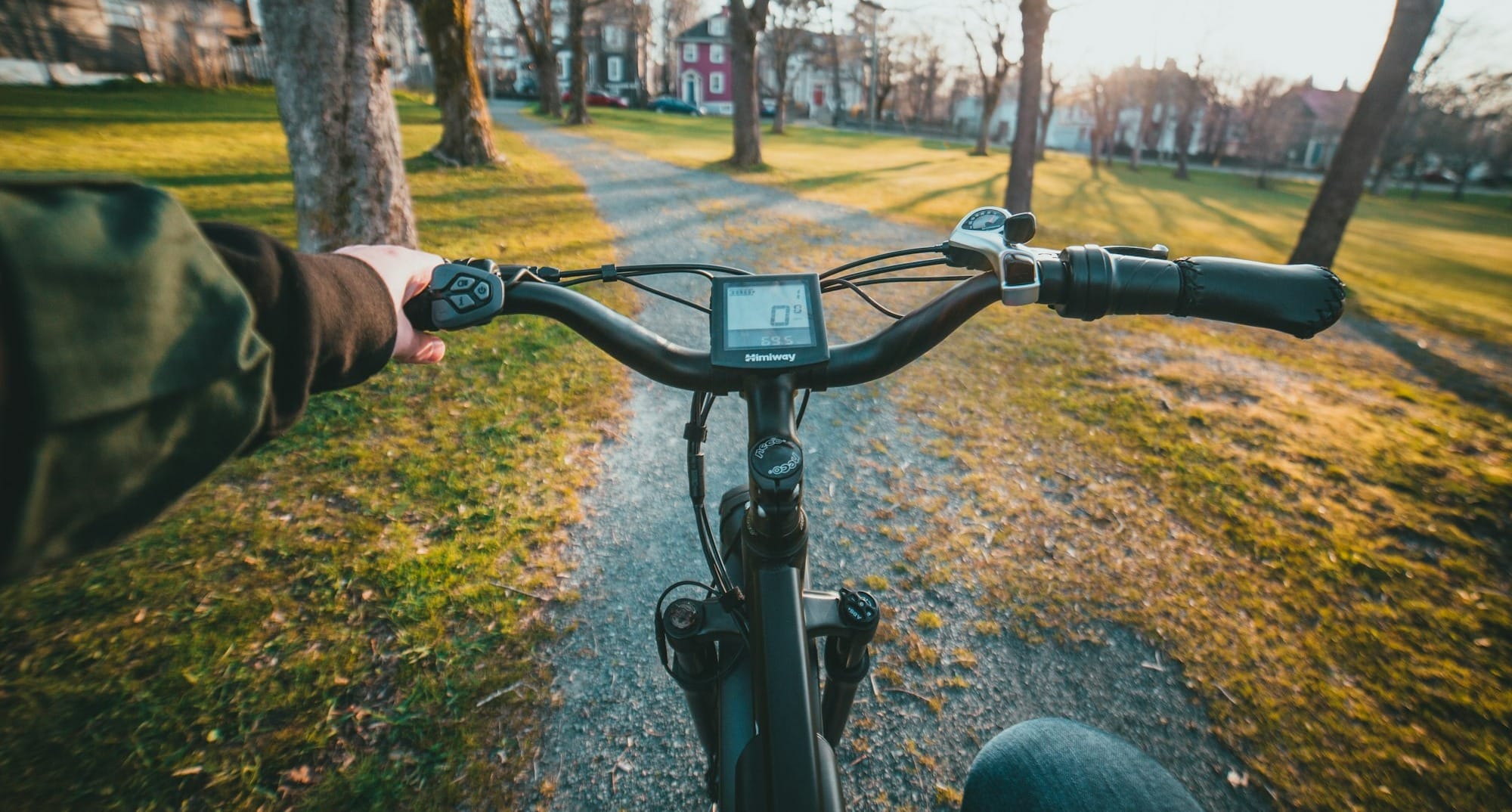 black bicycle on brown and green grass field during daytime