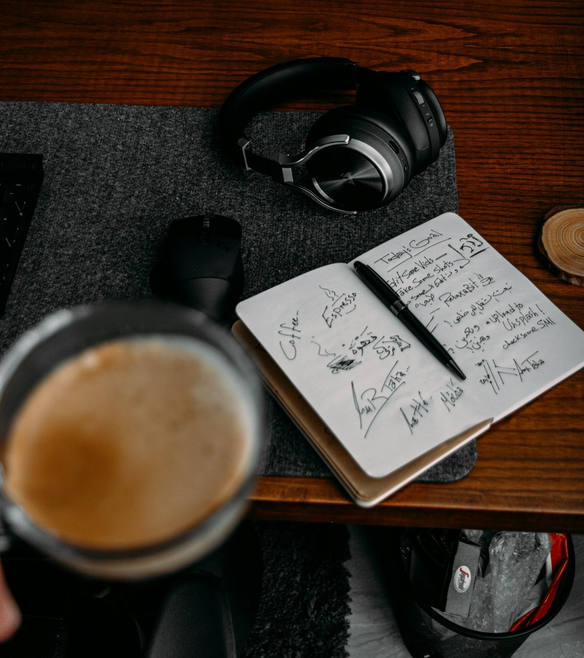 a cup of coffee and headphones