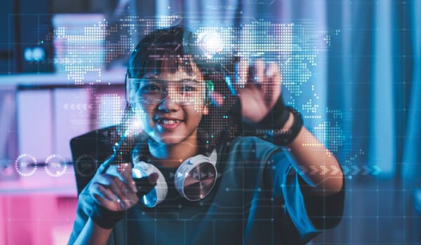 Bambini davanti a un tablet con icone di intelligenza artificiale, sicurezza digitale secondo Kaspersky.